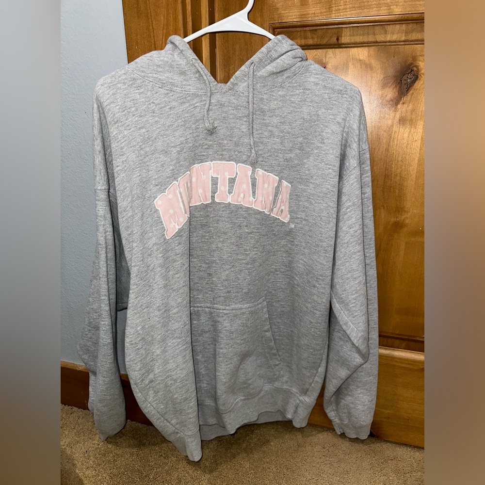 grey and pink montana hoodie with white polka dots